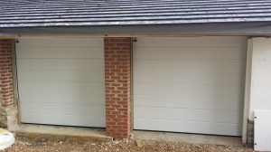 Two new fully insulated Teckentrup sectional garage doors