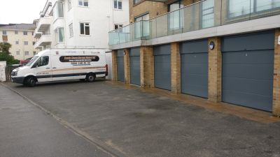 Sectional garage doors