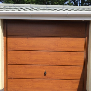 Golden Oak Hormann Garage Doors in Horizontal Decograin finish